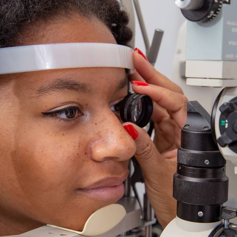 Young woman getting an eye exam